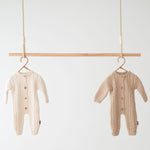 Jakopina Cable Knit Baby Romper Organic Cotton with classic Cable Knit pattern.