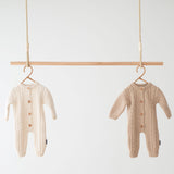 Jakopina Cable Knit Baby Romper Organic Cotton with classic Cable Knit pattern.