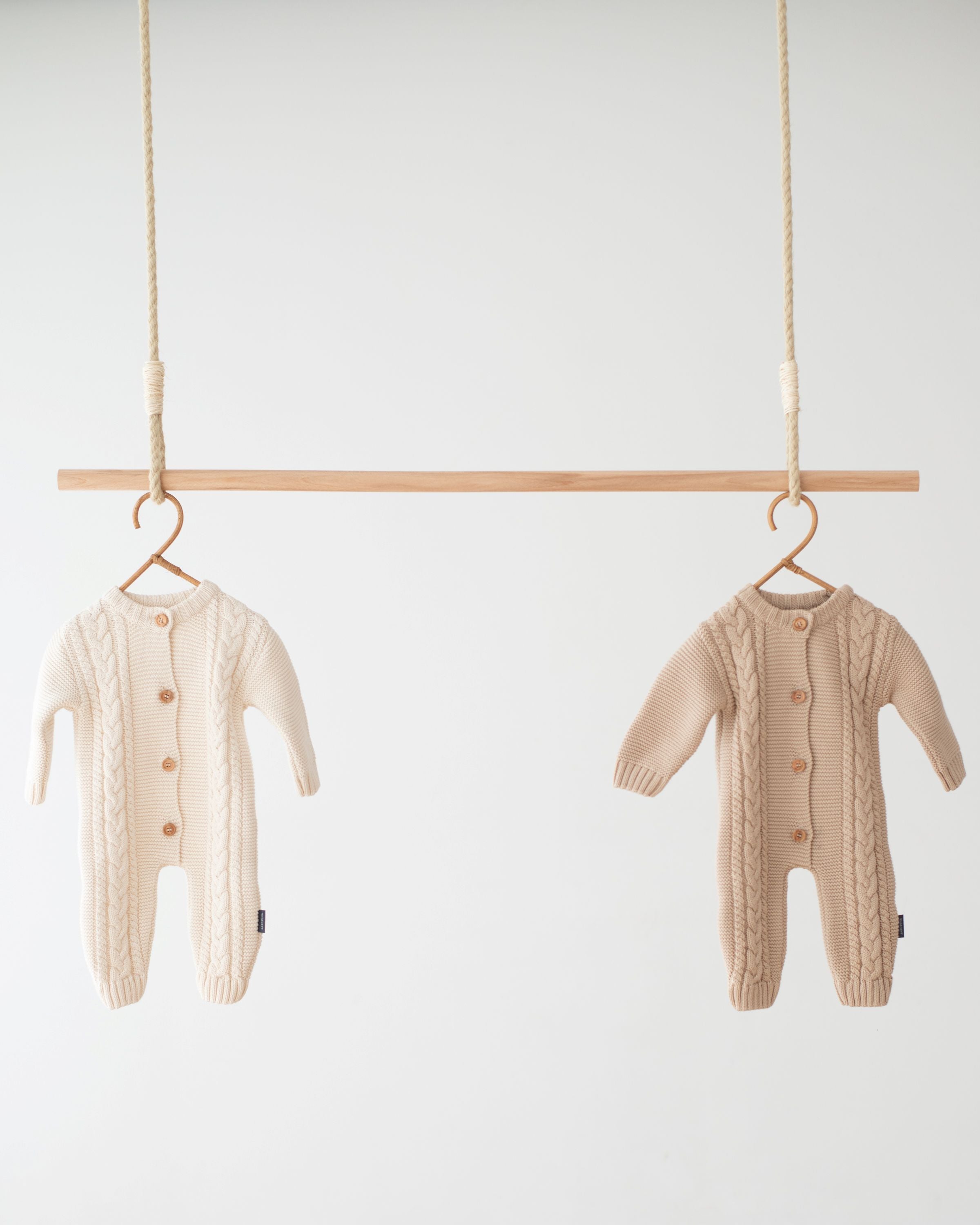 Jakopina Cable Knit Baby Romper Organic Cotton with classic Cable Knit pattern.